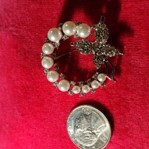 Silver plated w/mini rhinestones & faux pearls butterfly/wreath  brooch